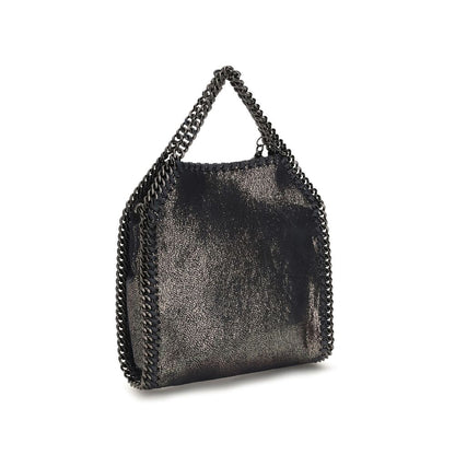 Small Shoulder Bag by Stella McCartney for women in organic cotton & polyester blue, patterned & monogram features a distinguished silhouette, showcasing a secure snap & magnetic and distinguished with versatile shoulder-strap & handle for a distinguished finish.
