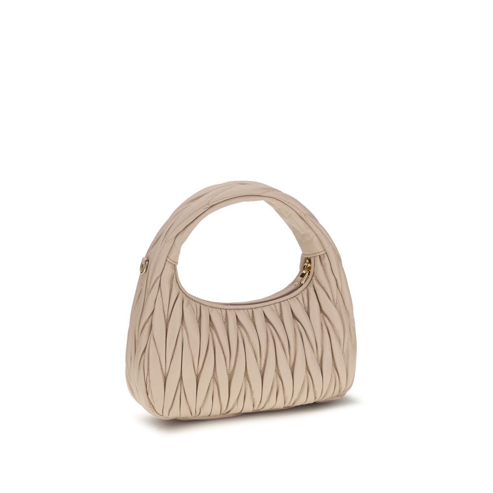 Quilted Hobo Handbag by Miu Miu for women in bos taurus calf leather beige, patterned & monogram features a refined silhouette, showcasing a secure zipper, organized single-compartment, and versatile shoulder-strap for a refined finish.