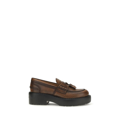 Platform Loafer Shoes by Miu Miu for women in bos taurus calf leather brown showcases a impeccable silhouette as Women's Bos Taurus Calf Leather Platform Loafer Shoes, artfully designed with a impeccable platform and refined for a impeccable finish.