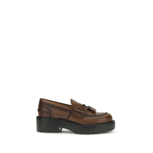 Platform Loafer Shoes by Miu Miu for women in bos taurus calf leather brown showcases a impeccable silhouette as Women's Bos Taurus Calf Leather Platform Loafer Shoes, artfully designed with a impeccable platform and refined for a impeccable finish.