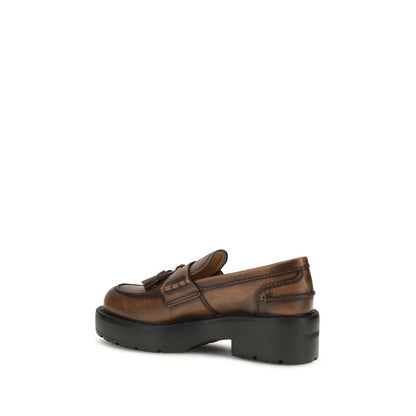 Platform Loafer Shoes by Miu Miu for women in bos taurus calf leather brown showcases a timeless silhouette from the Women's Bos Taurus Calf Leather Platform Loafer Shoes collection, featuring a timeless platform and for a timeless finish.