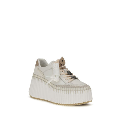 Sneakers by Chloé for women in bos taurus calfskin leather white & signature features a chic design, perfectly showcasing the chic low-top style of this Women's Low Top Bos Taurus Calfskin Leather Sneakers.