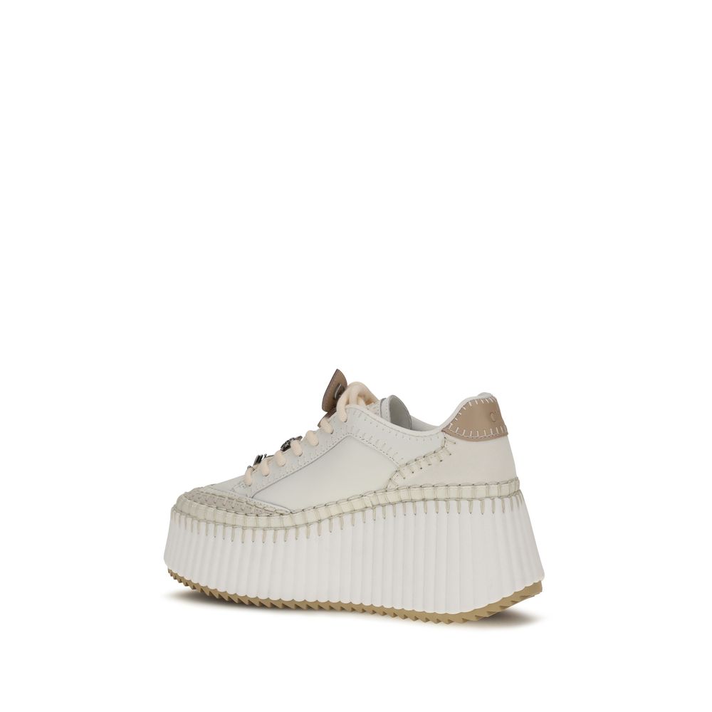 Sneakers by Chloé for women in bos taurus calfskin leather white & signature presents a on trend silhouette from the Women's Low Top Bos Taurus Calfskin Leather Sneakers collection, showcasing a on trend low-top style for an elevated aesthetic.