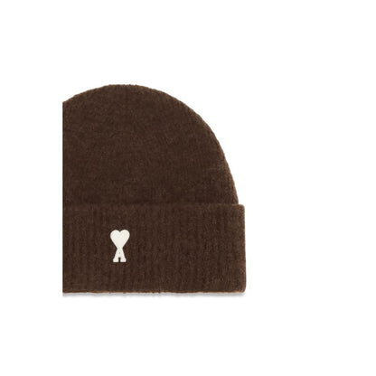 Beanie Hat by Ami Paris for men in wool brown presents a urban-chic silhouette, artfully capturing the essence of the urban-chic Wool Beanie Hat design for a sophisticated look.