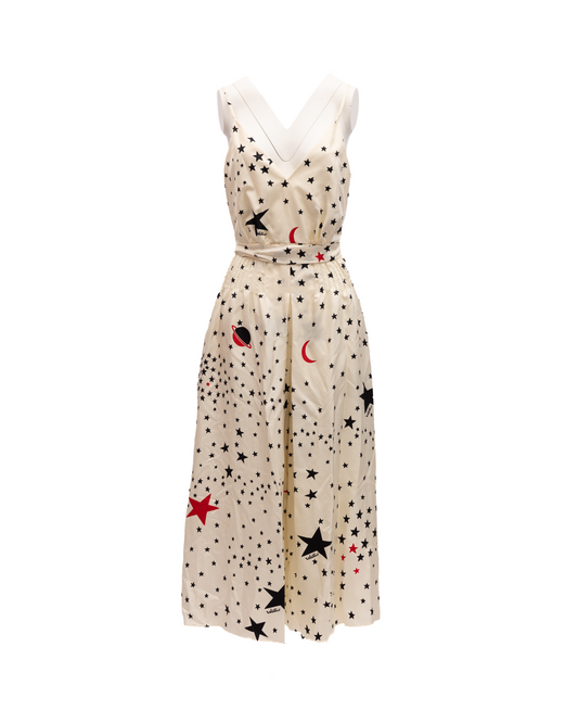 Dress by Valentino Garavani for women in lace black, cream, red & patterned features an magnificent silhouette, artfully detailed with a magnificent and that flows into an magnificent midi.