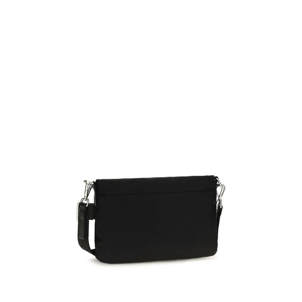 Compact Shoulder Bag by Prada for men in nylon black features a distinguished silhouette, showcasing a secure snap & button and distinguished with versatile shoulder-strap & adjustable-strap for a distinguished finish.