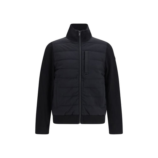 Puffer Jacket by Moose Knuckles for men in polyester & viscose black features an contemporary silhouette, showcasing a sophisticated high-collar neckline and contemporary pockets & insulated for a truly refined look.