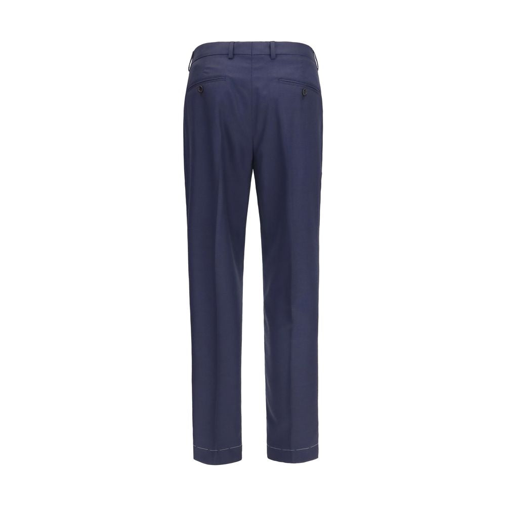 Trousers by Brunello Cucinelli for men in virgin wool blue & patterned features a artisanal silhouette, showcasing a sophisticated tapered-leg & regular-fit with a long and for a artisanal finish.