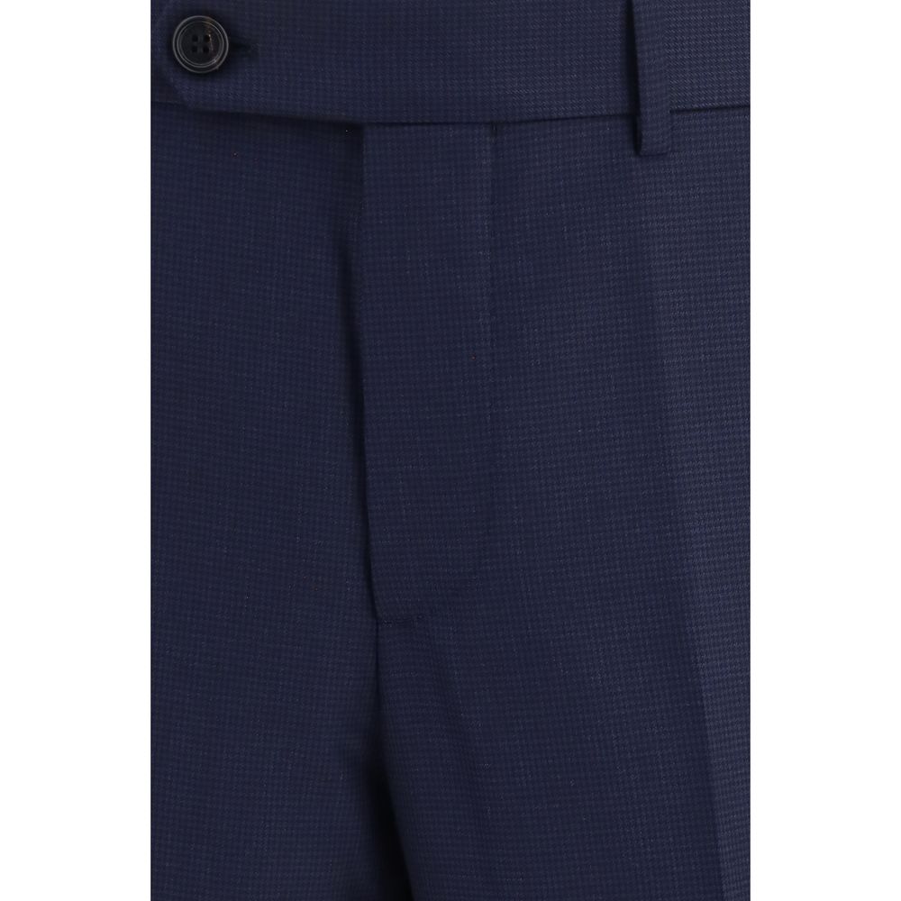 Trousers by Brunello Cucinelli for men in virgin wool blue & patterned presents a perennial silhouette, meticulously tailored with a tapered-leg & regular-fit cut, long finish, and an elegant .