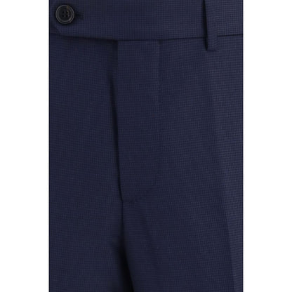 Trousers by Brunello Cucinelli for men in virgin wool blue & patterned presents a perennial silhouette, meticulously tailored with a tapered-leg & regular-fit cut, long finish, and an elegant .