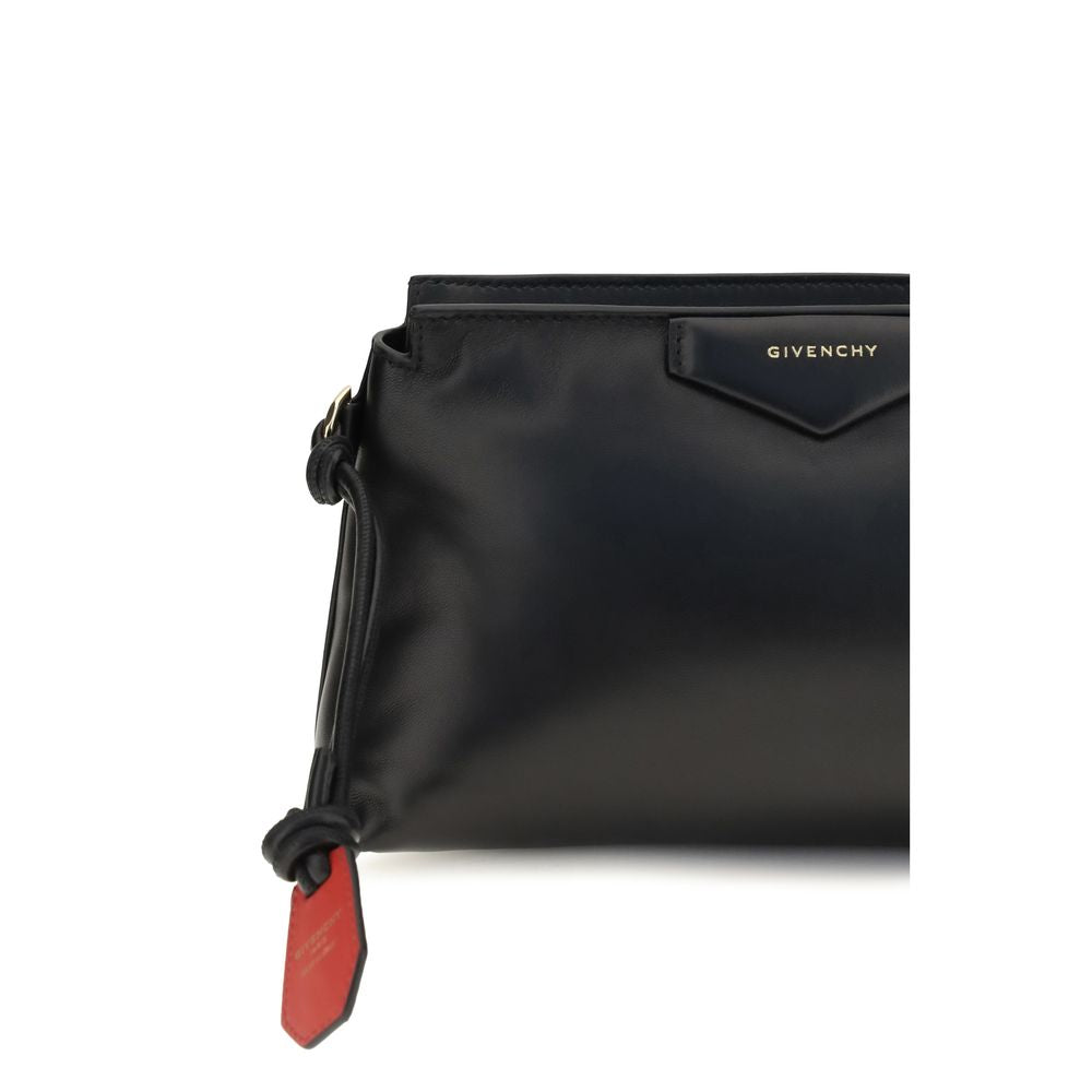 Wallet by Givenchy for women in lambskin leather & canvas black, gold & signature showcases a discerning silhouette, artfully capturing the essence of Antigona Lambskin Leather & Canvas Wallet with its functional .