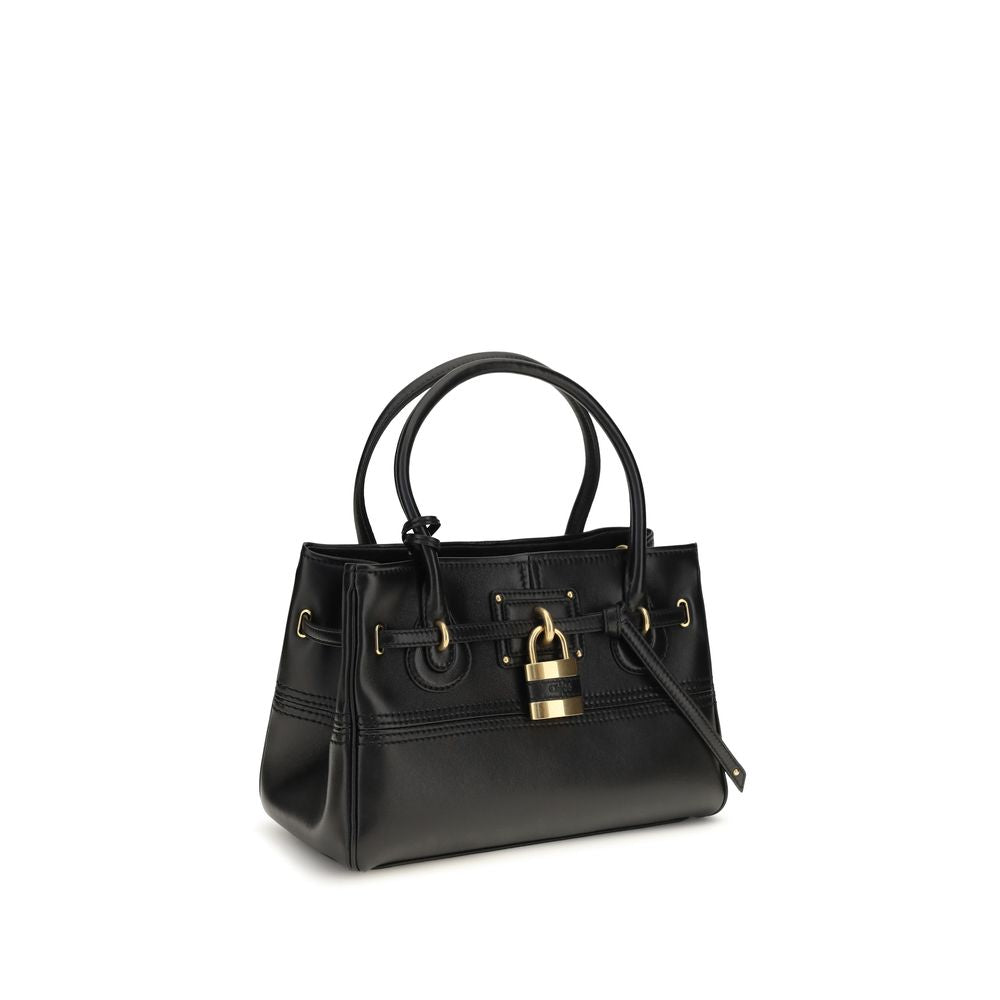 Shoulder Bag by Chloé for women in buffalo leather black & signature features a effortless chic silhouette with a secure zipper & buckle, ample , and versatile shoulder-strap for a effortless chic finish.