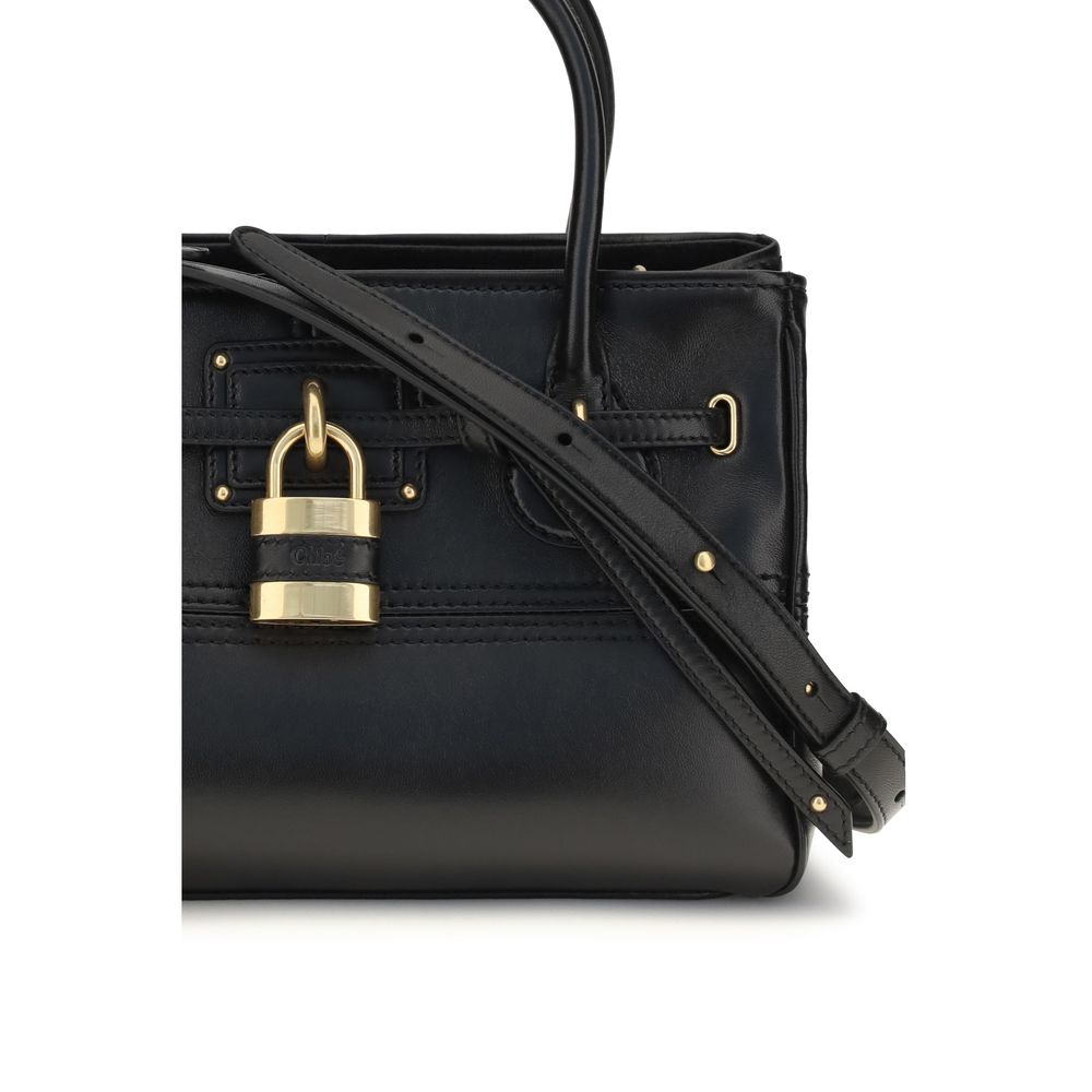 Shoulder Bag by Chloé for women in buffalo leather black & signature features a distinguished silhouette, showcasing a secure zipper & buckle and distinguished with versatile shoulder-strap for a distinguished finish.