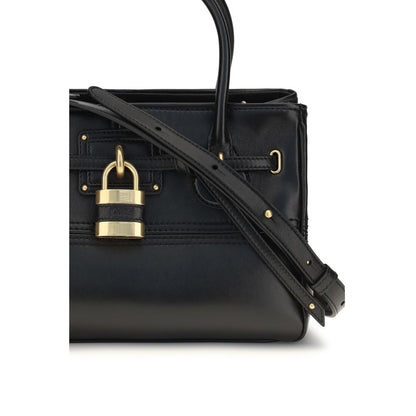 Shoulder Bag by Chloé for women in buffalo leather black & signature features a distinguished silhouette, showcasing a secure zipper & buckle and distinguished with versatile shoulder-strap for a distinguished finish.