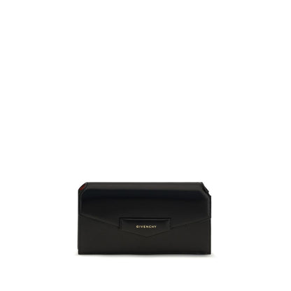 Cardholder Wallet by Givenchy for women in bos taurus calfskin leather black, gold & signature showcases a discerning silhouette, artfully capturing the essence of Antigona Bos Taurus Calfskin Leather Cardholder Wallet with its functional card-organization.
