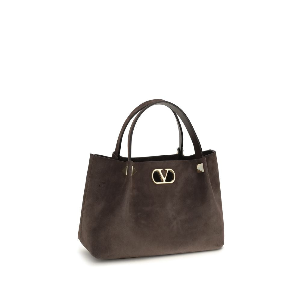 Small Shoulder Bag by Valentino Garavani for women in bos taurus suede calf leather brown & signature features a enviable silhouette, showcasing a secure , ample , and enviable shoulder-strap, adjustable-strap & handle for a enviable finish.