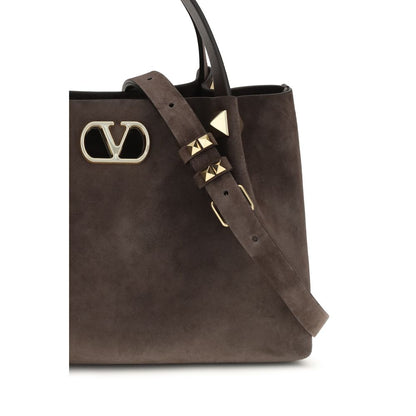 Small Shoulder Bag by Valentino Garavani for women in bos taurus suede calf leather brown & signature features a effortless chic silhouette with a secure , ample , and versatile shoulder-strap, adjustable-strap & handle for a effortless chic finish.