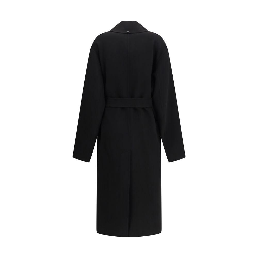Overcoat by Max Mara for women in wool black presents a luxurious silhouette, showcasing a luxurious lapel neckline and sophisticated pockets for a premium, luxurious look.