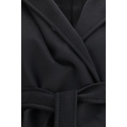 Hooded Overcoat by Max Mara for women in wool black showcases a enveloping silhouette, detailed with distinctive pockets & hooded and a enveloping hooded neckline.