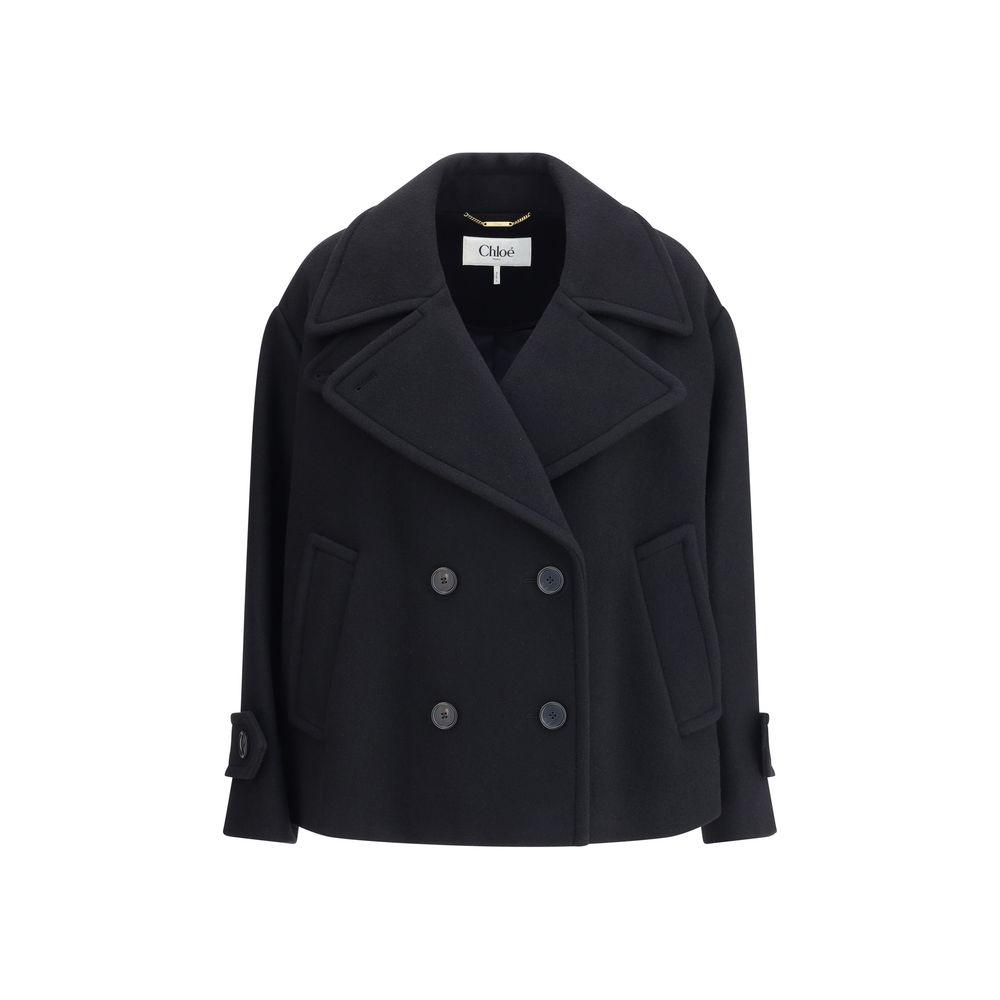 Overcoat by Chloé for women in polyamide & wool black, horn & natural features an voluminous silhouette, showcasing distinct pockets and a voluminous for a truly voluminous aesthetic.