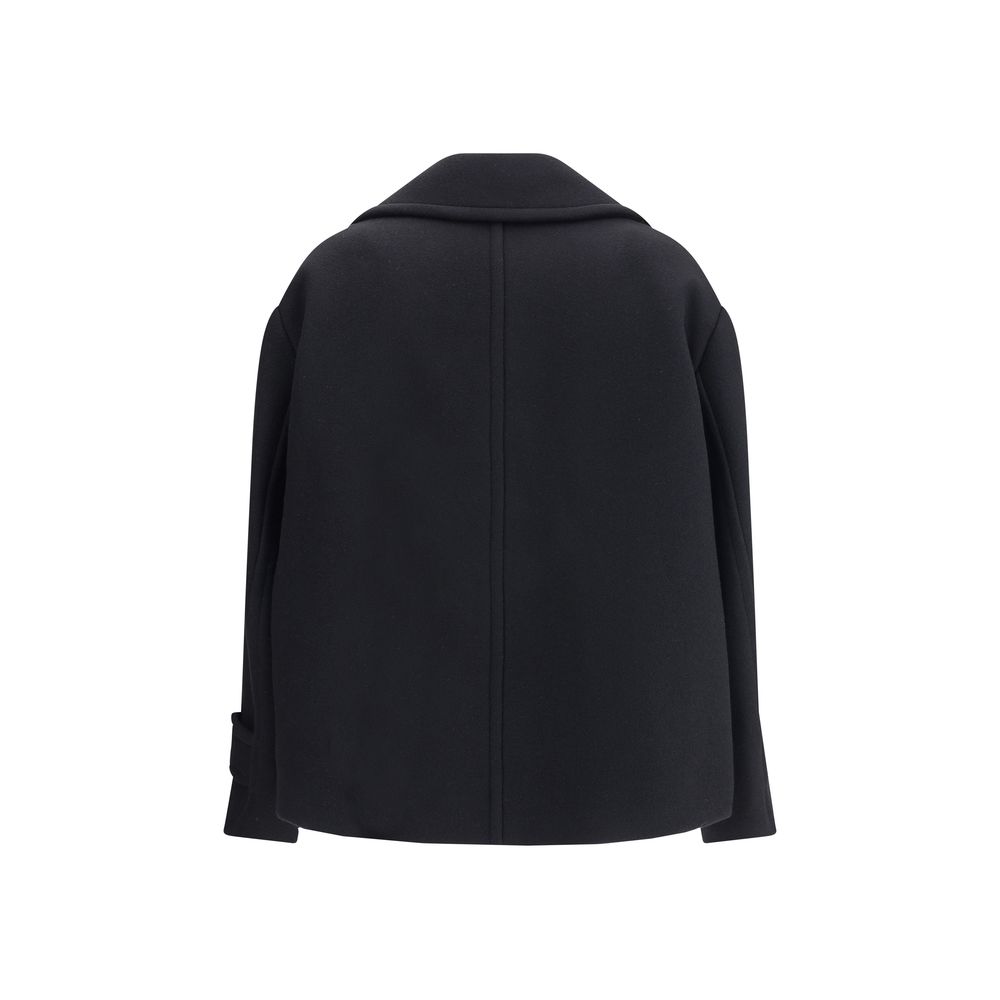 Overcoat by Chloé for women in polyamide & wool black, horn & natural showcases a architectural silhouette, artfully detailed with a distinctive and functional pockets for a architectural finish.