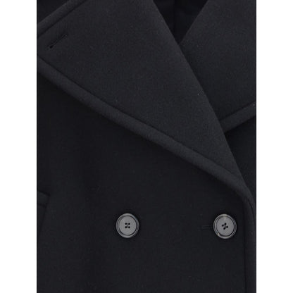 Overcoat by Chloé for women in polyamide & wool black, horn & natural features a cosy chic silhouette, artfully detailed with a sophisticated and premium pockets for a cosy chic finish.