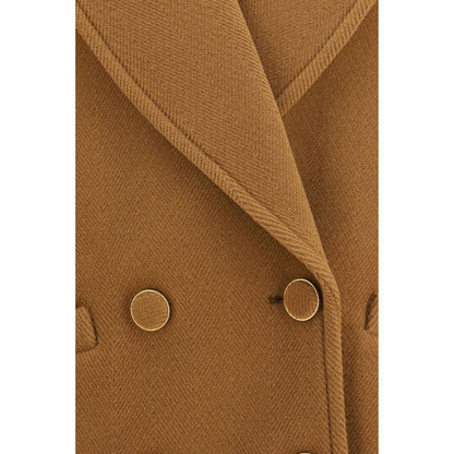 Overcoat by Chloé for women in merino wool brown, gold & herringbone showcases a enveloping silhouette, detailed with distinctive pockets and a enveloping .