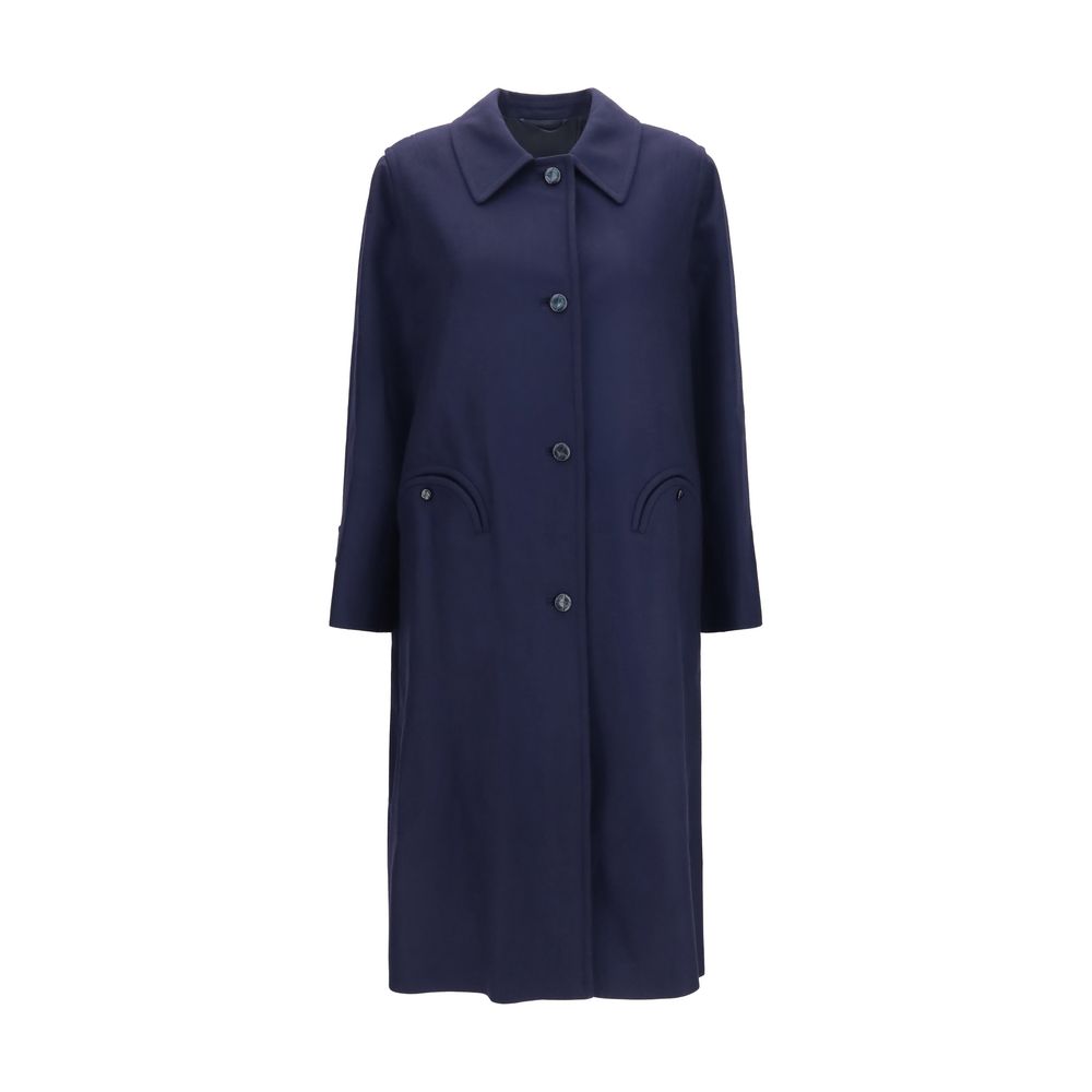 Trench Coat by Blazé Milano for women in merino wool blue presents a utilitarian silhouette, showcasing a utilitarian and sophisticated pockets & insulated for a truly utilitarian look.