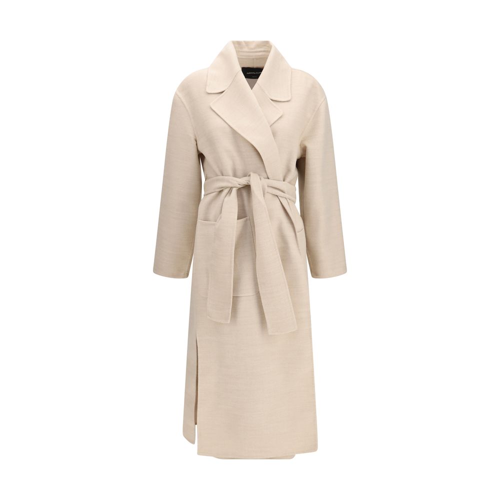 Overcoat by Fabiana Filippi for women in merino wool beige showcases a architectural silhouette, artfully detailed with a distinctive and functional pockets for a architectural finish.