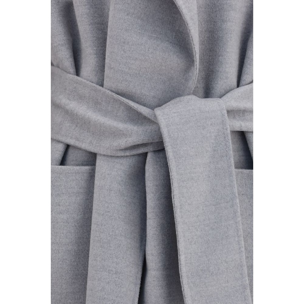 Overcoat by Fabiana Filippi for women in merino wool gray features an satoral silhouette, showcasing a sophisticated and satoral pockets for a premium, timeless look.