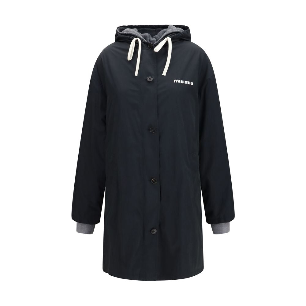 Hooded Pea Coat by Miu Miu for women in cotton black features an relaxed-luxury silhouette, showcasing a sophisticated hooded neckline and premium pockets & hooded for a truly relaxed-luxury look.