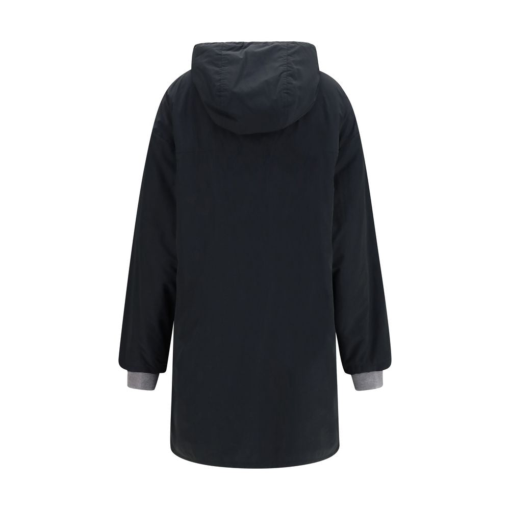 This Hooded Pea Coat by Miu Miu for women in cotton and black showcases a on trend silhouette, detailed with a on trend hooded neckline and distinctive pockets & hooded.