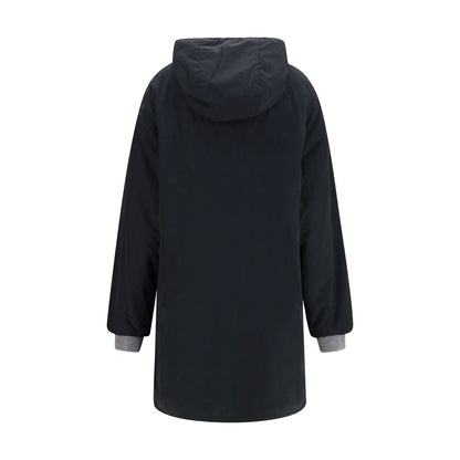 This Hooded Pea Coat by Miu Miu for women in cotton and black showcases a on trend silhouette, detailed with a on trend hooded neckline and distinctive pockets & hooded.
