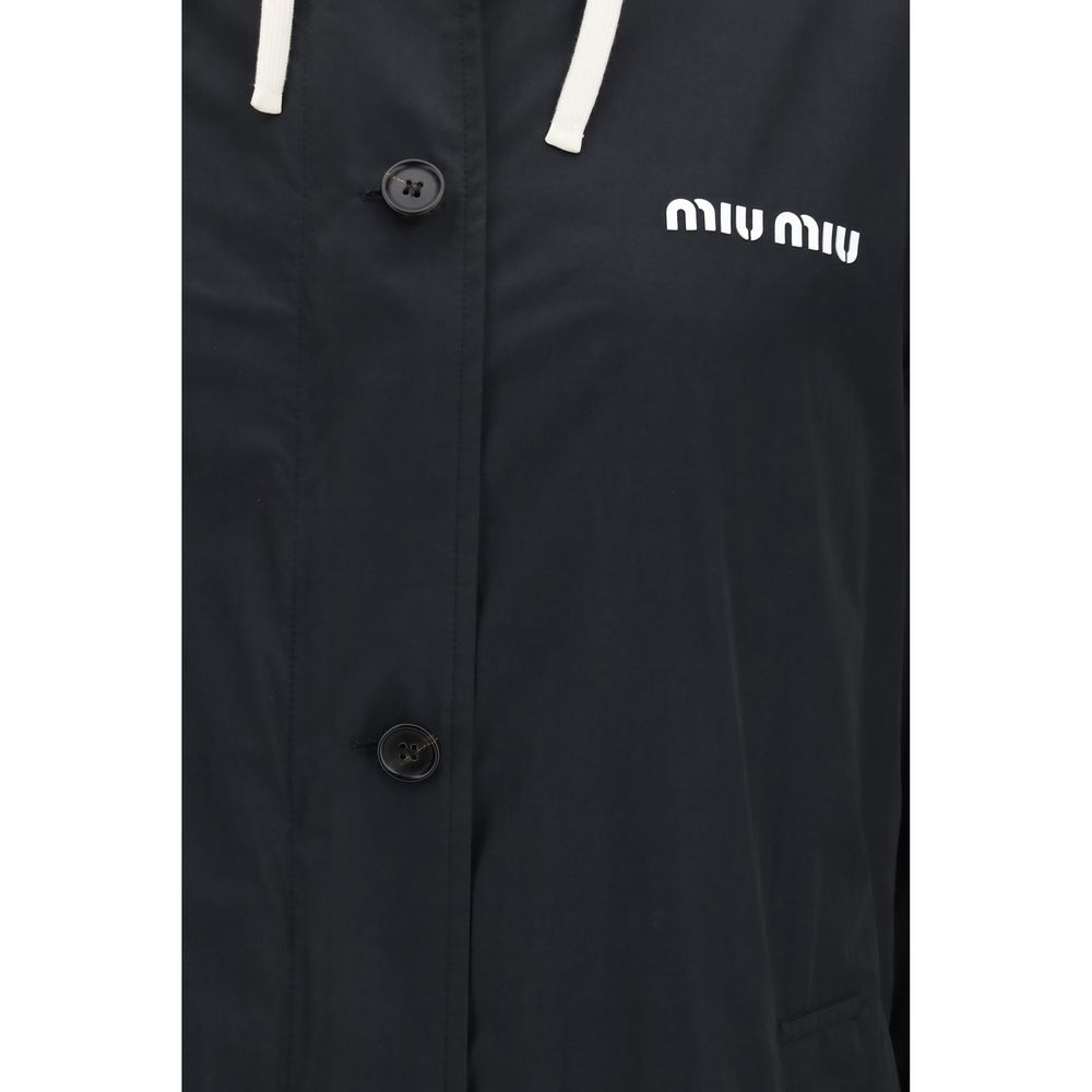 Hooded Pea Coat by Miu Miu for women in cotton black features a stylish silhouette, detailed with pockets & hooded and a stylish for a sophisticated finish.