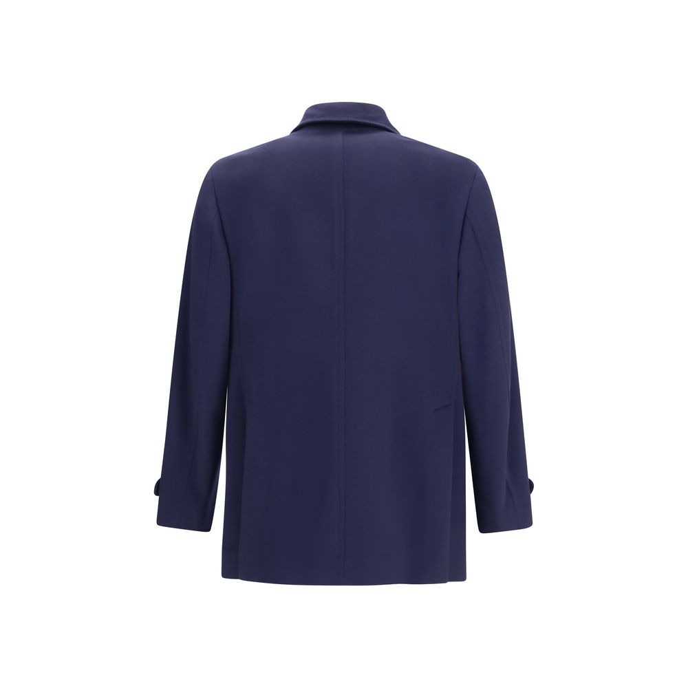Overcoat by Brunello Cucinelli for men in merino wool blue showcases a enveloping silhouette, detailed with distinctive pockets and a enveloping .