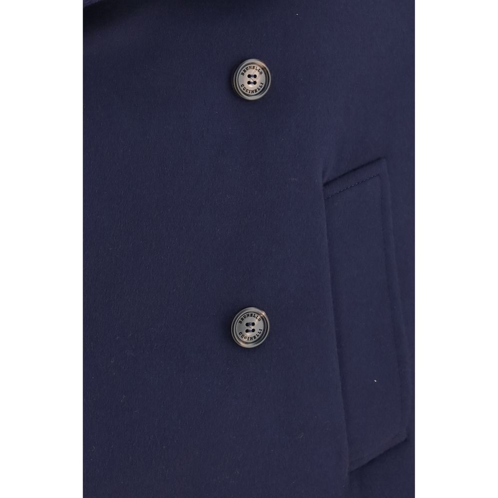 Overcoat by Brunello Cucinelli for men in merino wool blue features an voluminous silhouette, showcasing distinct pockets and a voluminous for a truly voluminous aesthetic.