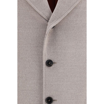 Overcoat by Brunello Cucinelli for men in virgin wool beige features an voluminous silhouette, showcasing distinct pockets and a voluminous for a truly voluminous aesthetic.