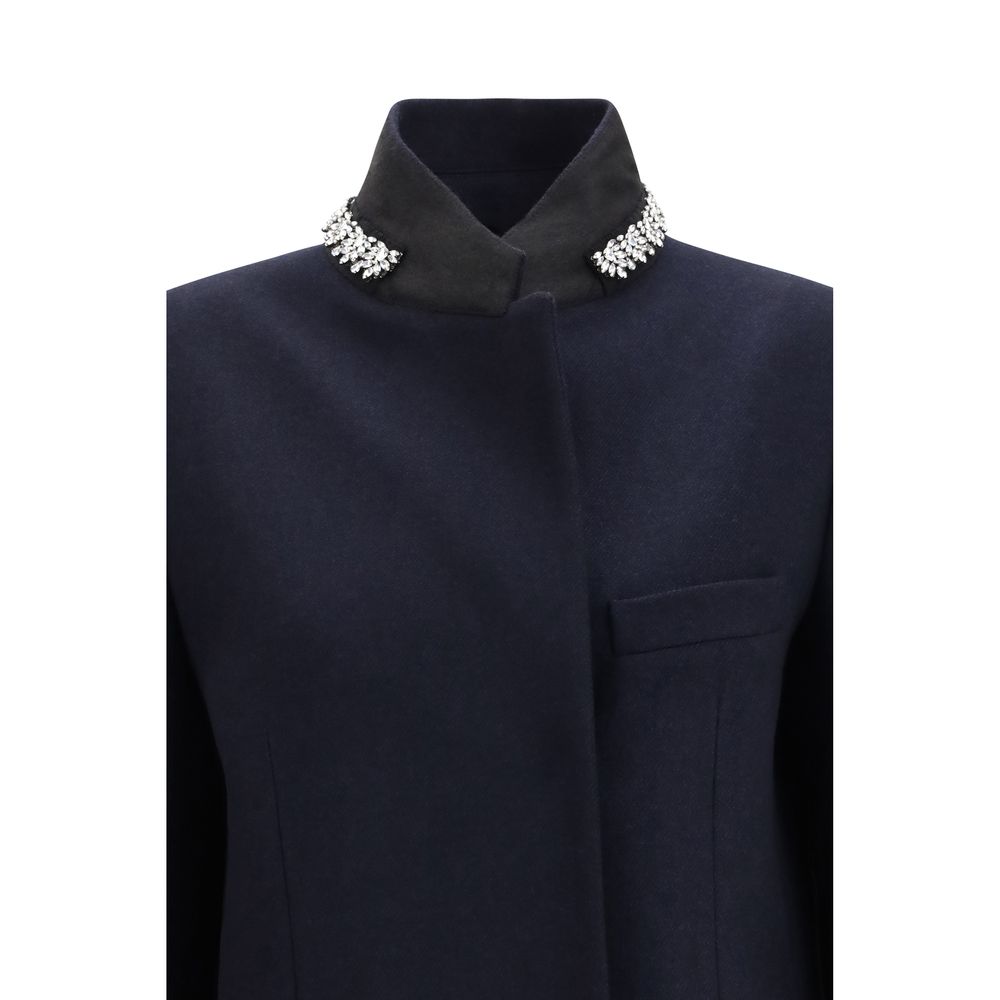 Overcoat by Prada for women in wool blue features a contemporary silhouette showcasing a contemporary single-breasted neckline and refined pockets for a sophisticated finish.