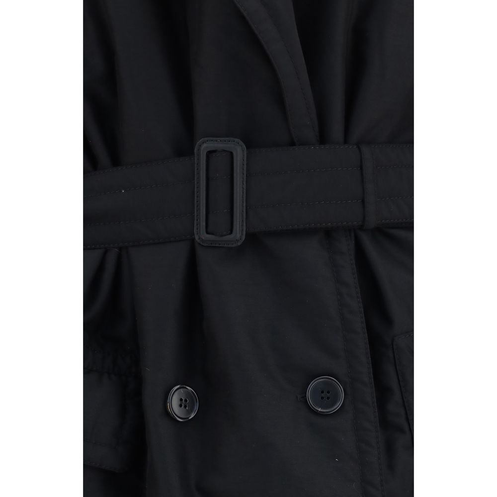 Overcoat by Maison Margiela for women in polyamide wool black showcases a architectural silhouette, artfully detailed with a distinctive and functional pockets & insulated for a architectural finish.