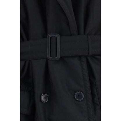 Overcoat by Maison Margiela for women in polyamide wool black showcases a architectural silhouette, artfully detailed with a distinctive and functional pockets & insulated for a architectural finish.