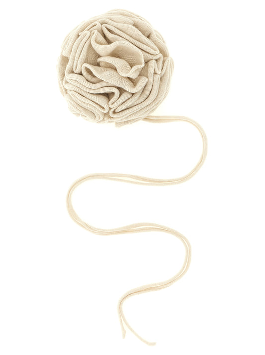 Scarf by NUDE for women in cashmere viscose nude, white & floral showcases a warm silhouette from the Cashmere Viscose Wrap Scarf collection, offering a warm drape that exudes sophisticated luxury.