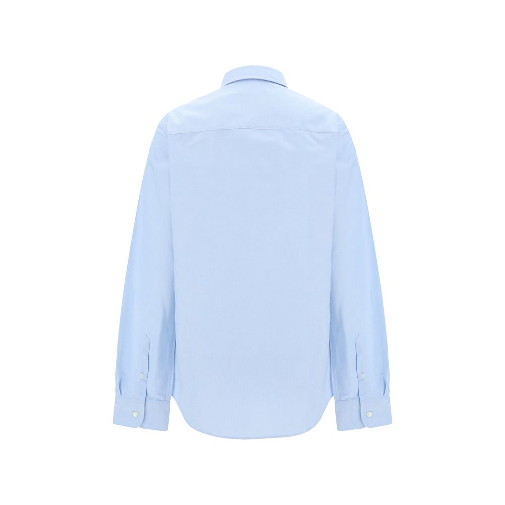 Dress Shirt by Ami Paris for women in cotton blue presents a discerning silhouette, showcasing a sophisticated and for a truly discerning finish.