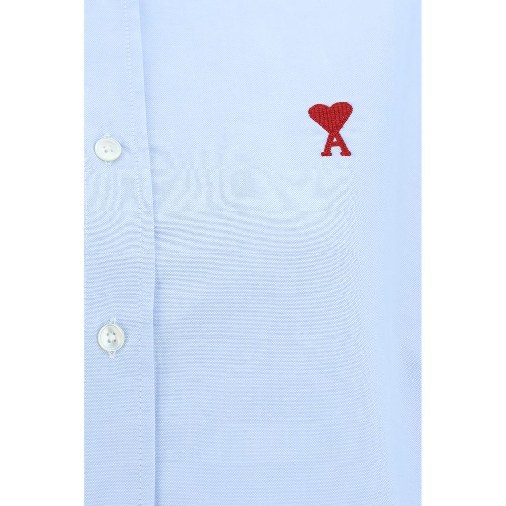 Dress Shirt by Ami Paris for women in cotton blue, featuring a nuanced and nuanced for a sophisticated finish.