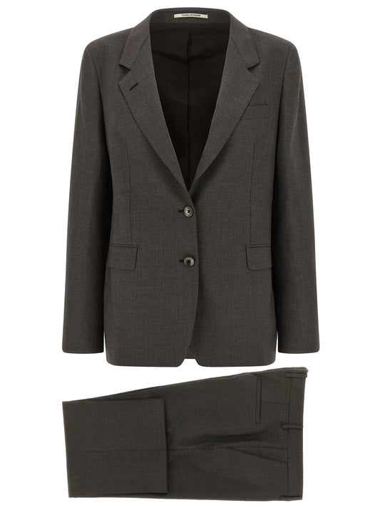 Pant Suit by Tagliatore for women in virgin wool gray showcases a sartorial silhouette, artfully detailed with a sophisticated and a sartorial straight & wide for a refined, high-fashion aesthetic.
