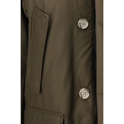 Parka by Woolrich for men in polyamide cotton duck & goose down bicolour, presenting a cosy silhouette with distinctive pockets, hooded & insulated and a refined .