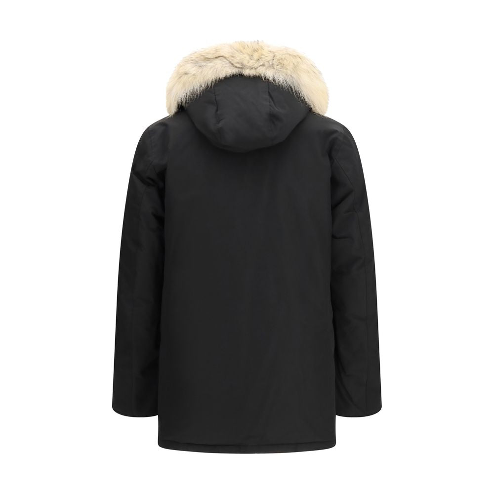 Hooded Parka by Woolrich for men in polyamide cotton duck-down & fur black features an avant garde silhouette, showcasing refined pockets, hooded & insulated and a sophisticated hooded neckline for a polished look.