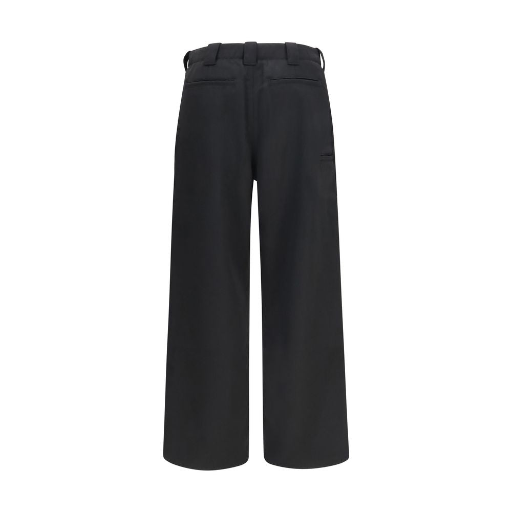 Chinos Pants by Kenzo for men in virgin wool black features an utilitarian-chic silhouette, showcasing a utilitarian-chic regular-fit with a long cut and for a refined look.