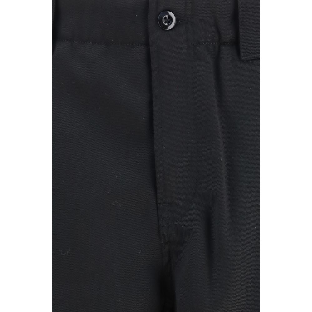 Chinos Pants by Kenzo for men in virgin wool black presents a sartorial luxe silhouette, showcasing a sophisticated regular-fit with a long and for a premium, sartorial luxe finish.