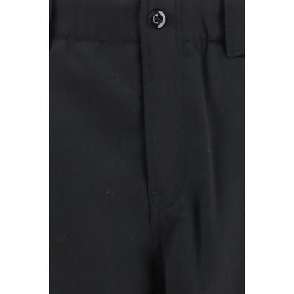 Chinos Pants by Kenzo for men in virgin wool black presents a sartorial luxe silhouette, showcasing a sophisticated regular-fit with a long and for a premium, sartorial luxe finish.