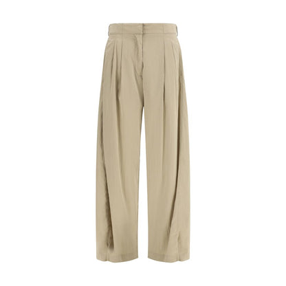 Casual Pants by The Row for women in silk & nylon beige features an sophisticated low rise and regular-fit with a precise long, creating a sophisticated and sophisticated silhouette.